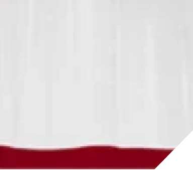 Close-up view of clean white and red paint booth wall panels
