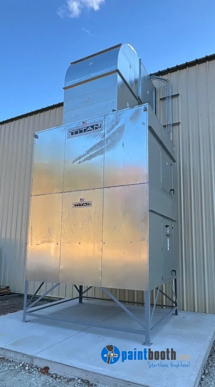 Booth-mounted air makeup unit connected to a paint booth.