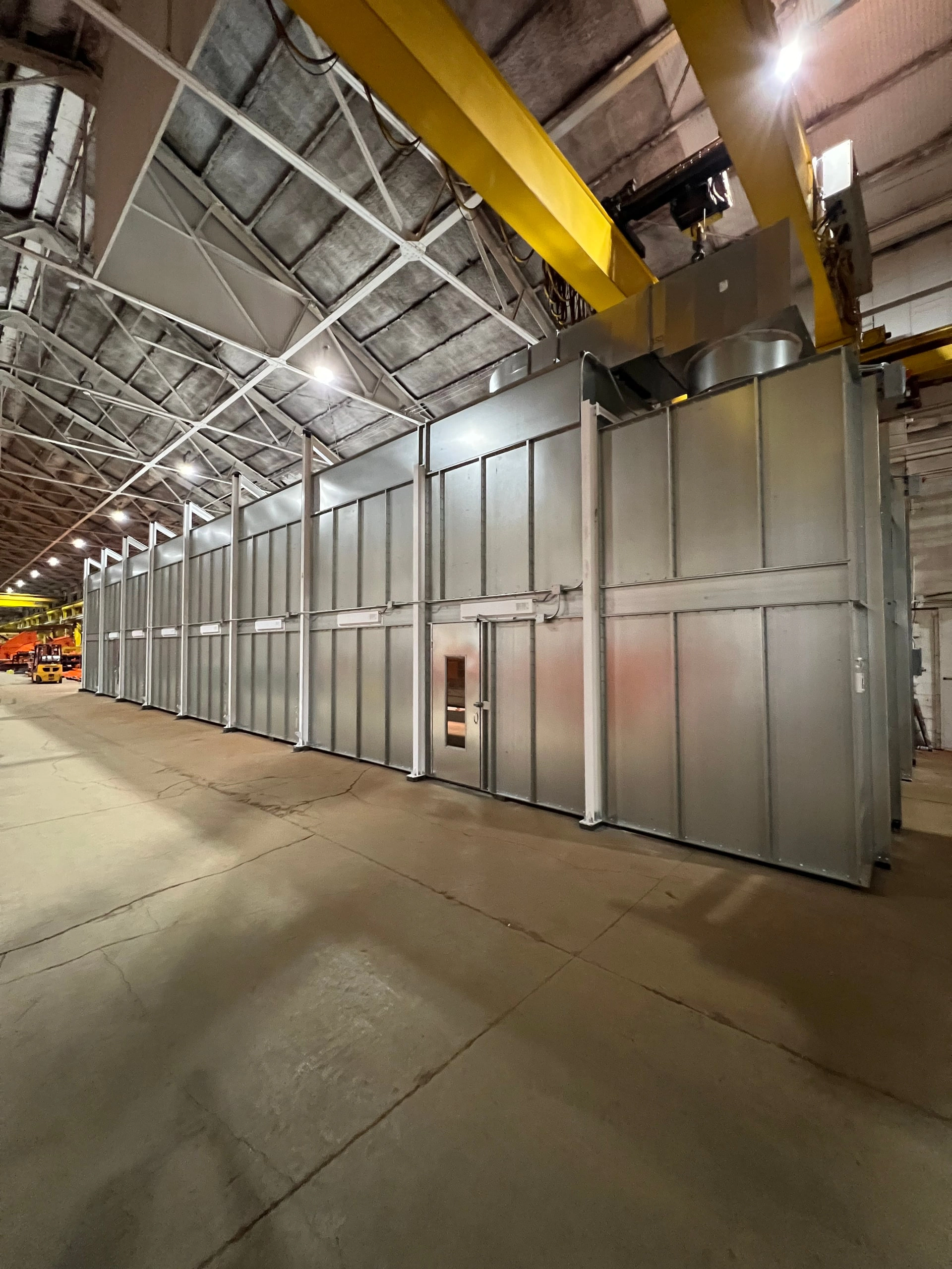 Industrial booth with crane