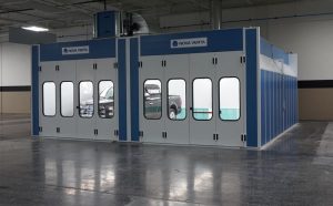 Nova Verta professional automotive paint booth with large doors and windows