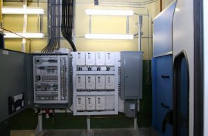 Industrial control panel and electrical cabinet inside a paint booth facility