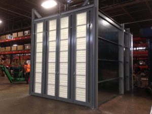 Industrial paint booth filter panels inside a manufacturing facility