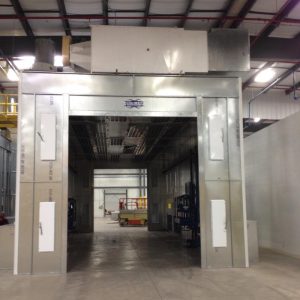 Large industrial paint booth by Col-Met in warehouse setting