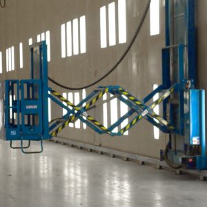 Retractable lift system inside a paint booth